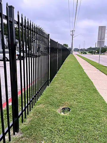 Three-rail security picket along a street frontage, Commercial lot
