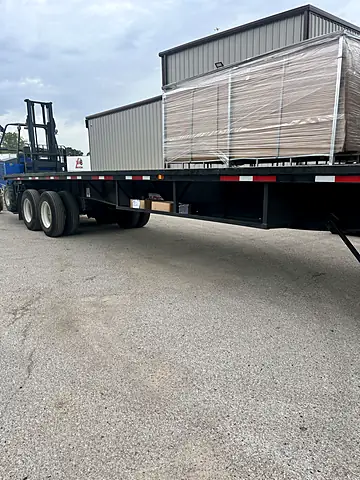 Crate staged for forklift unloading, Delivery